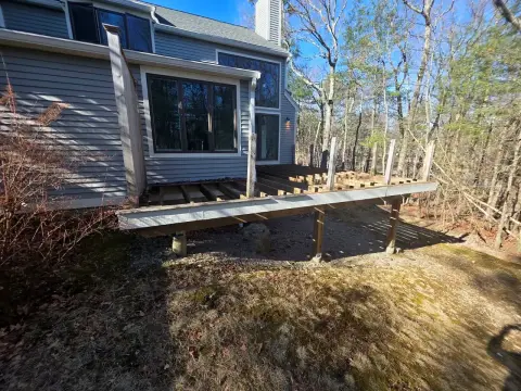 The same deck before: the old deck structure, framing only